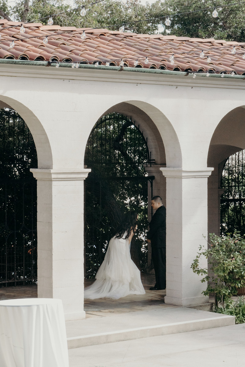 Bride framed by architecture